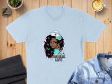 Load image into Gallery viewer, Light blue t-shirt with #NurseLife graphic featuring a woman with curly hair.
