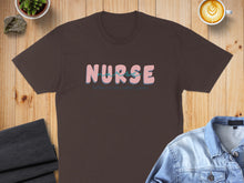 Load image into Gallery viewer, Brown t-shirt with "Nurse" and "coffee, scrubs, rubber gloves" text.
