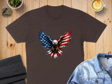Load image into Gallery viewer, T-shirt with patriotic eagle design in red, white, and blue colors.
