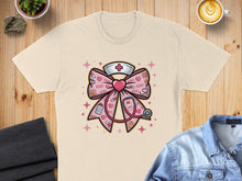 Load image into Gallery viewer, Pink nurse bow graphic with stethoscope, hearts, and "XOXO" text.
