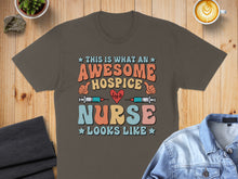 Load image into Gallery viewer, Awesome Hospice Nurse t-shirt with syringes and heartbeat graphic.
