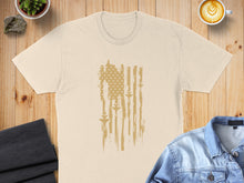 Load image into Gallery viewer, T-shirt with distressed American flag design in tan and gold.
