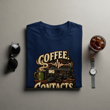 Load image into Gallery viewer, Navy t-shirt with "Coffee. Contacts." graphic featuring a radio, mug, and microphone.
