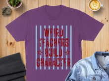 Load image into Gallery viewer, Purple t-shirt with "Weird Teachers Build Character" text and blue stripes.
