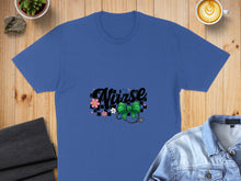 Load image into Gallery viewer, Blue t-shirt with "Nurse" text, stethoscope, and checkered flowers.
