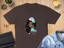 Load image into Gallery viewer, Brown t-shirt with graphic of a nurse with pink text "#NurseLife".
