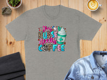 Load image into Gallery viewer, T-shirt with "This Nurse Needs Coffee" text and a coffee drink graphic.
