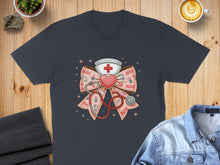Load image into Gallery viewer, Dark t-shirt featuring a nurse-themed bow with stethoscope and "XOXO" graphics.

