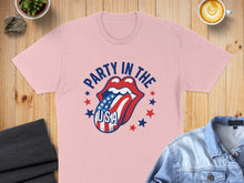 Load image into Gallery viewer, Pink t-shirt with "Party in the USA" text and patriotic lips graphic.
