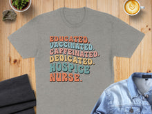 Load image into Gallery viewer, T-shirt with text "EDUCATED. VACCINATED. DEDICATED. HOSPICE NURSE."
