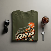 Load image into Gallery viewer, Olive green t-shirt with "QRP" graphic, sunglasses, watch, and iced coffee.
