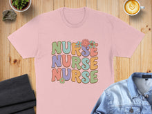 Load image into Gallery viewer, Pink t-shirt with "Nurse Nurse Nurse" in retro colorful lettering and flowers.
