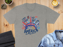 Load image into Gallery viewer, Gray t-shirt with "Land of the Free 4th of July America" graphic.
