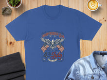 Load image into Gallery viewer, Blue t-shirt with "Independence Day 4th of July EST 1776" and American flags.
