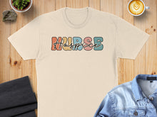 Load image into Gallery viewer, Cream t-shirt with "HOSPICE" text in colorful, retro-style lettering.
