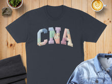 Load image into Gallery viewer, Dark blue t-shirt with "CNA" in colorful patchwork letters.
