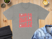 Load image into Gallery viewer, Gray t-shirt with "Nurse Nurse Nurse" text and small white flowers.
