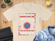 Load image into Gallery viewer, Cream t-shirt with "Freedom" graphic and text about peace.
