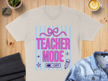 Load image into Gallery viewer, T-shirt with "Teacher Mode" text, pink bow, and star graphics.
