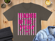 Load image into Gallery viewer, T-shirt with "TEACHER OF THE YEAR" text in pink stripes and pencil graphic.
