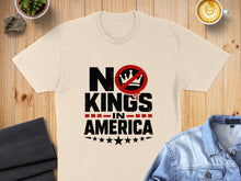 Load image into Gallery viewer, Cream t-shirt with "No Kings In America" text and stars.
