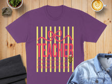 Load image into Gallery viewer, Purple t-shirt with "TEACHER" in pink, striped background, and inspirational text.
