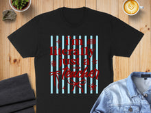 Load image into Gallery viewer, Black t-shirt with red text "I'm literally just a Teacher" and blue stripes.

