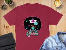Load image into Gallery viewer, Burgundy t-shirt with graphic of a nurse with afro, butterflies, and "Trauma Queen" text.
