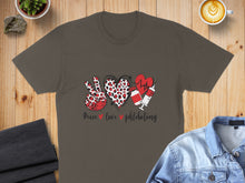 Load image into Gallery viewer, Brown t-shirt with "Peace love phlebotomy" text and leopard print heart, stethoscope, and syringe.
