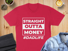 Load image into Gallery viewer, Red t-shirt with "STRAIGHT OUTTA MONEY #DADLIFE" text.
