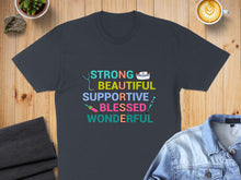 Load image into Gallery viewer, Dark t-shirt with "STRONG BEAUTIFUL SUPPORTIVE NURSE" in colorful text.
