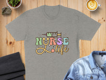 Load image into Gallery viewer, Grey t-shirt with "Nurse Life" text and a syringe graphic.

