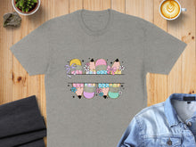 Load image into Gallery viewer, Pencil-themed split graphic with bows and flowers on a gray t-shirt.
