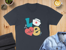 Load image into Gallery viewer, Dark t-shirt with "LOVE" design featuring heart, stethoscope, and nurse hat.
