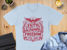 Load image into Gallery viewer, Light blue t-shirt with "Faith, Family, and Freedom 1776-2026" emblem.
