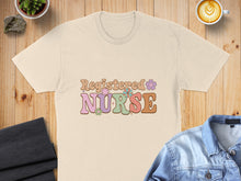 Load image into Gallery viewer, Beige t-shirt with "Registered Nurse" and colorful floral text.
