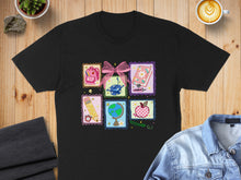Load image into Gallery viewer, Black t-shirt with colorful school-themed stamps: books, globe, apple, pencil, and backpack.
