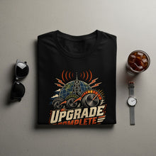 Load image into Gallery viewer, Black t-shirt with "Upgrade Complete" graphic featuring a globe and gauges.
