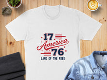 Load image into Gallery viewer, White t-shirt with "1776 America Land of the Free" in red and blue.
