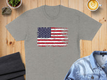 Load image into Gallery viewer, Gray t-shirt with distressed American flag graphic.

