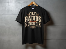 Load image into Gallery viewer, Black t-shirt with text "OLD RADIOS NEVER DIE" and a vintage radio graphic.
