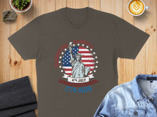 Load image into Gallery viewer, T-shirt with Statue of Liberty, American flag, and "Celebrating America 1776-2026" text.
