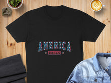 Load image into Gallery viewer, Black t-shirt with "AMERICA EST. 1776" in stars and stripes design.
