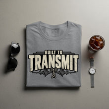 Load image into Gallery viewer, Gray t-shirt with "BUILT TO TRANSMIT" text and radio tower graphic.
