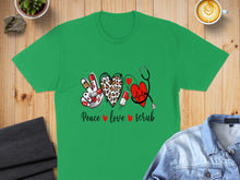 Load image into Gallery viewer, Green t-shirt with Peace Love Scrub design featuring stethoscope, heart, and leopard print.
