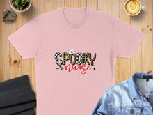 Load image into Gallery viewer, Pink t-shirt with "Spooky Nurse" text and Halloween graphics.

