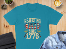 Load image into Gallery viewer, Teal t-shirt with "Rejecting Kings Since 1776" text and stars.
