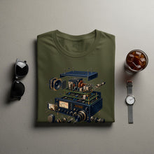 Load image into Gallery viewer, Olive green t-shirt with an exploded view graphic of a vintage radio transceiver.
