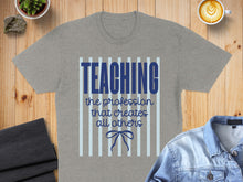 Load image into Gallery viewer, Grey t-shirt with "TEACHING the profession that creates all others" text.
