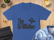 Load image into Gallery viewer, Blue t-shirt with "The Grillfather" text and a flame graphic.
